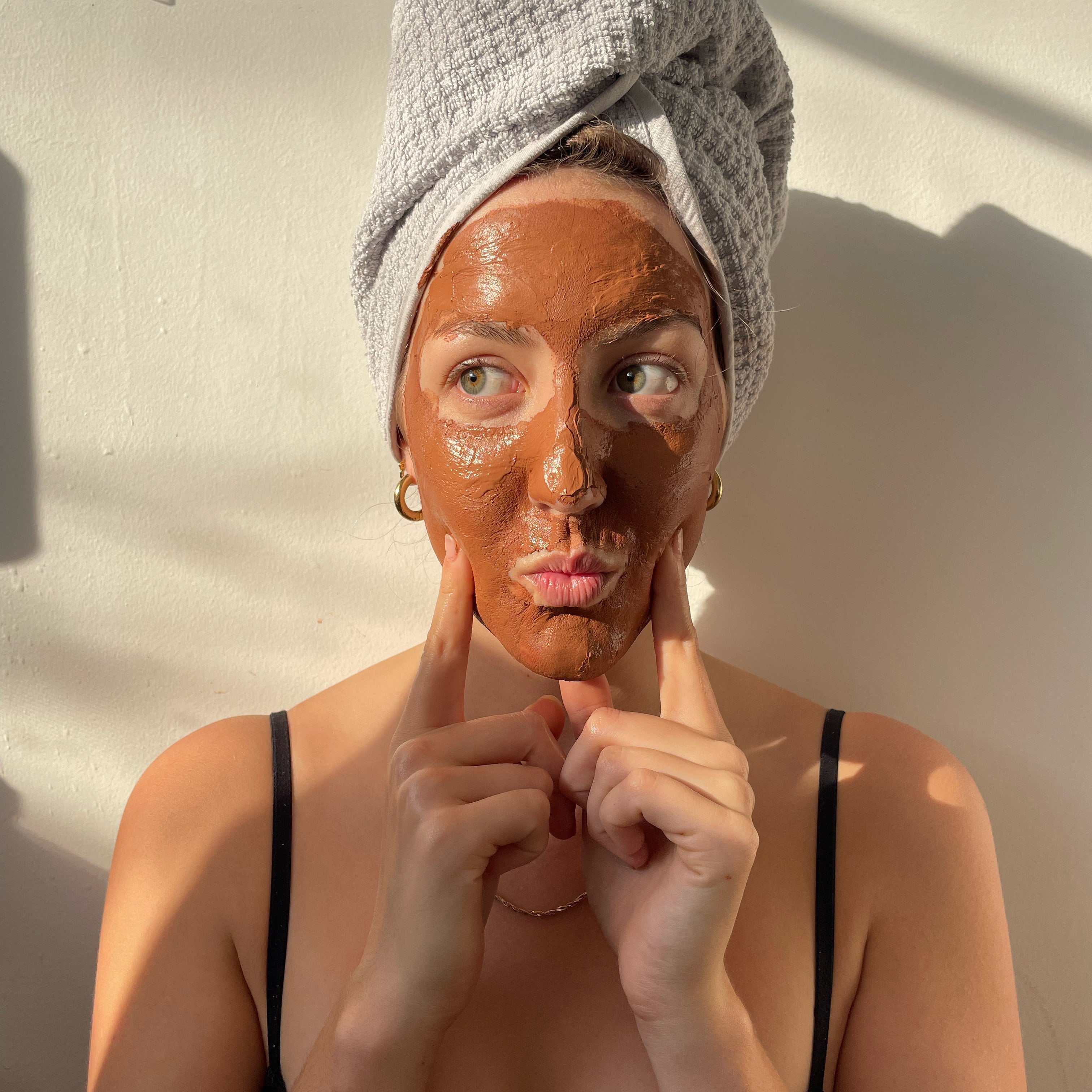 Oily skin, Emma with pink clay facemask on
